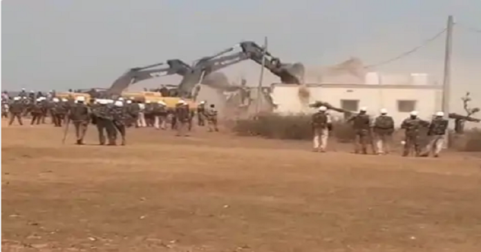 Bulldozers action on former minister house